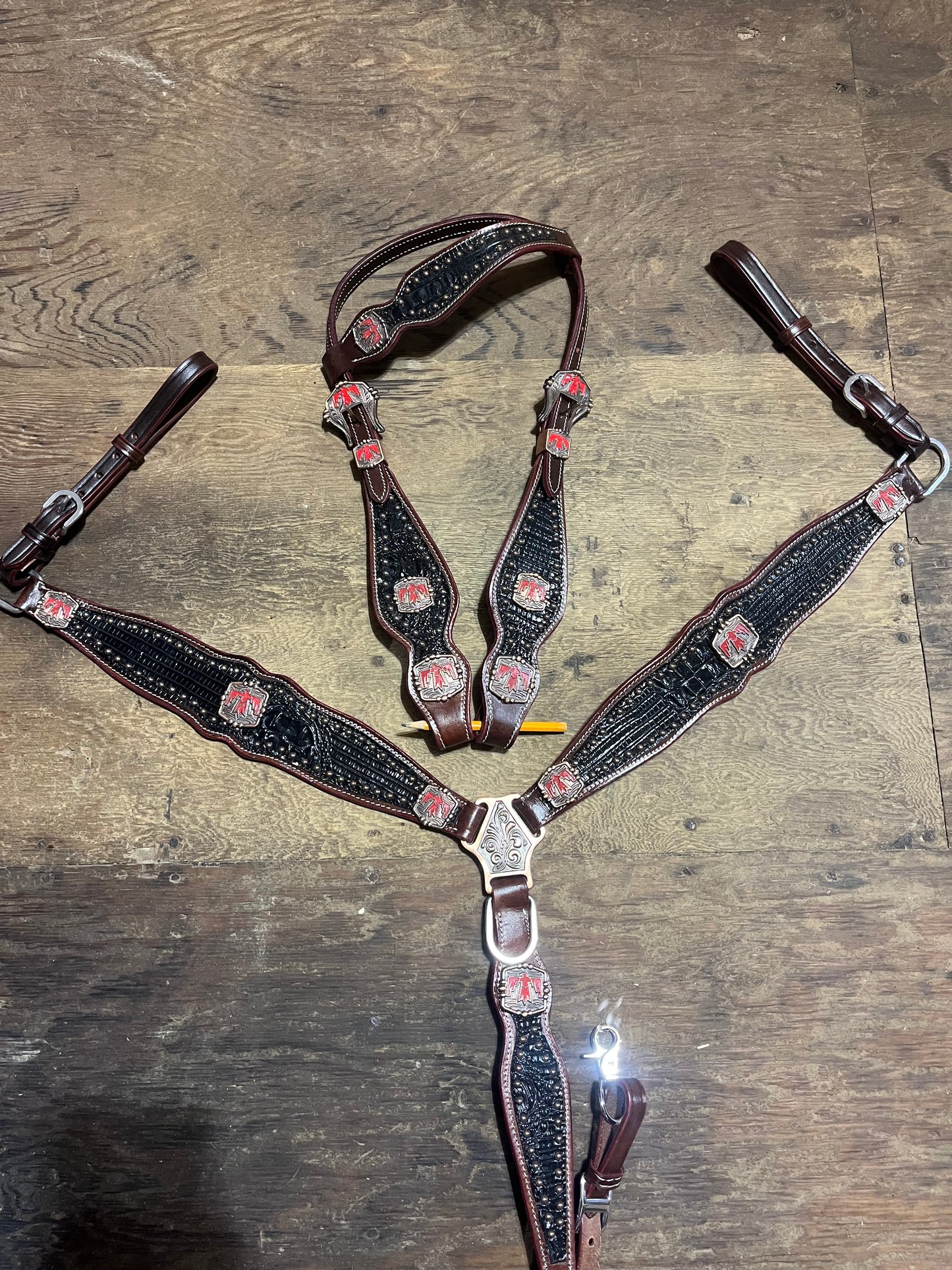Black tack set with red thunderbird concho
