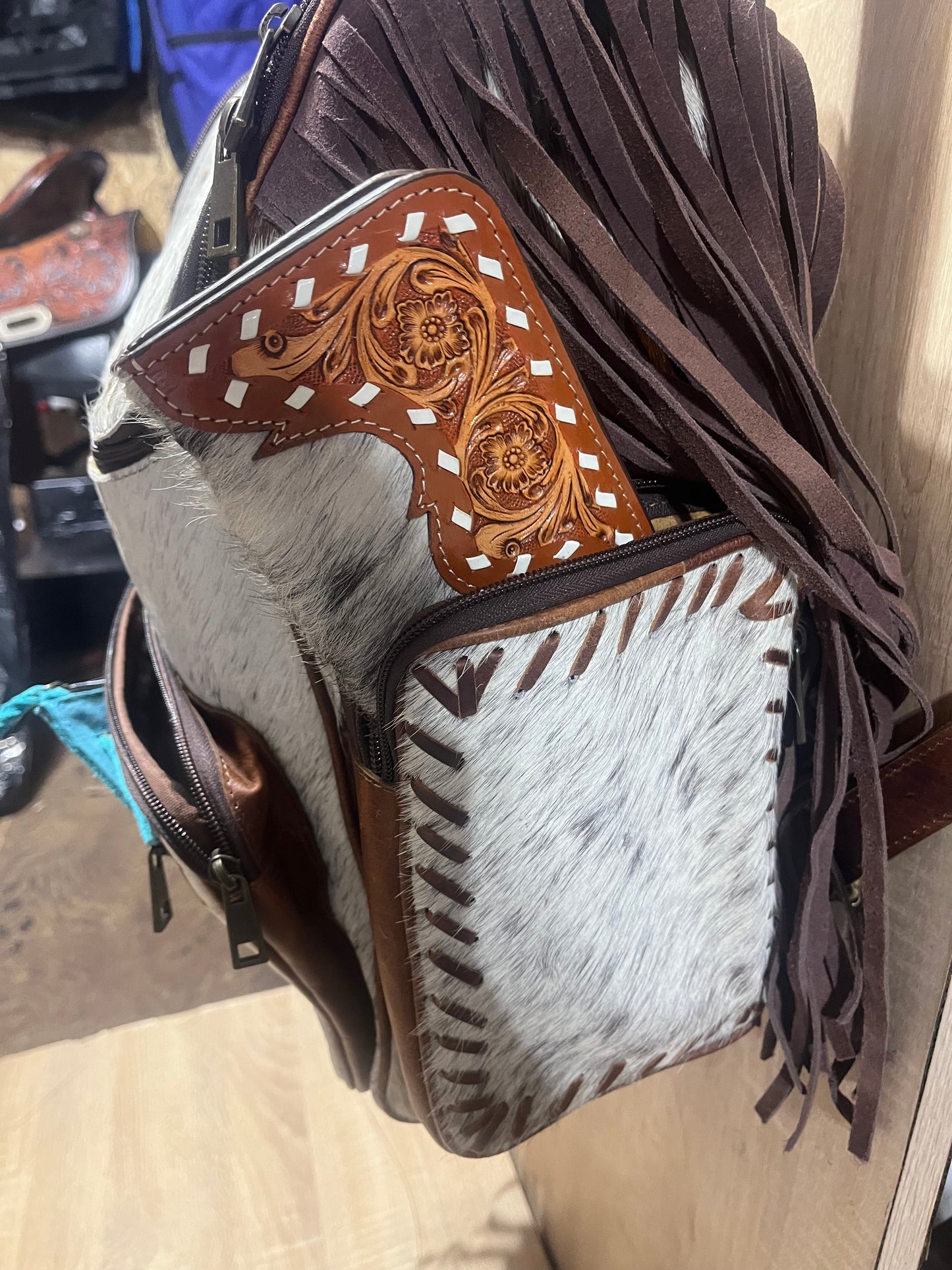 Hair on cowhide backpack