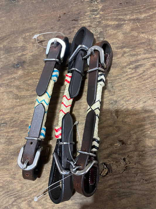 Colored rawhide curb straps