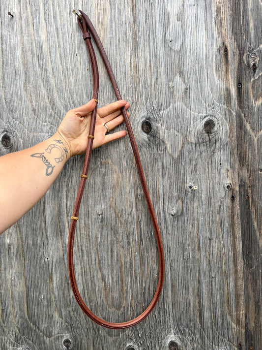 Rolled Don Rich over under with rawhide