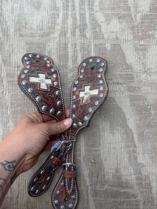 Used cowhide spur straps