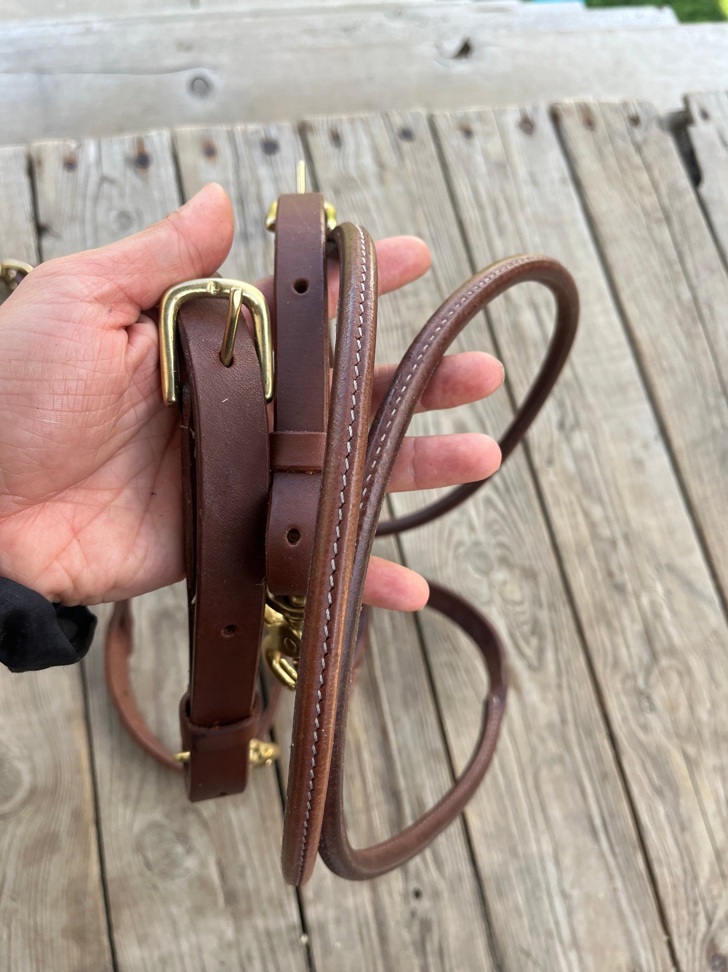 Rolled fully adjustable length supple leather barrel/ roping reins with snaps