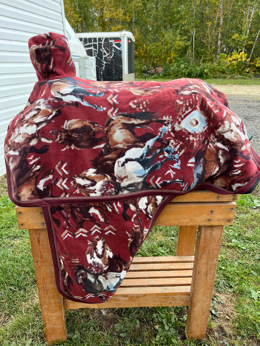 Burgundy horse print western fleece full coverage saddle cover with fenders, horn, & stirrup pockets