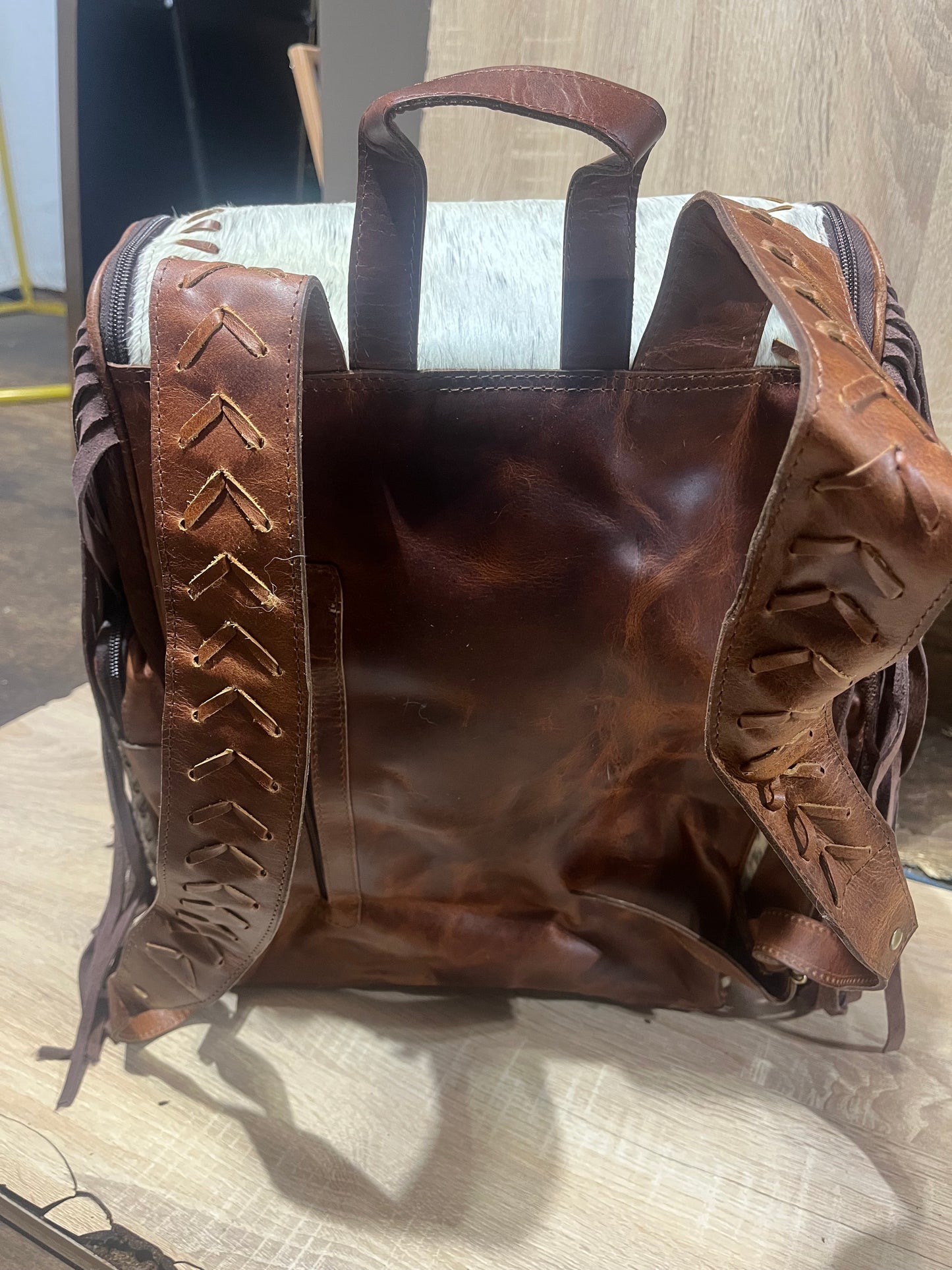 Hair on cowhide backpack