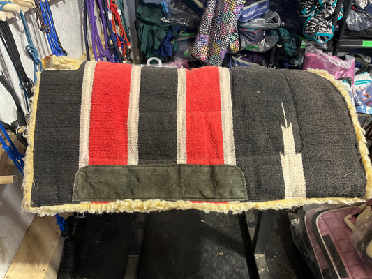 Red and black used western pad