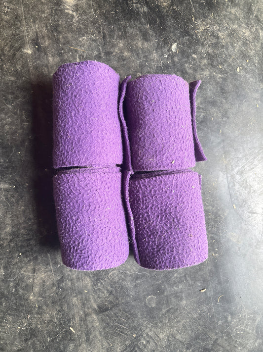 Four purple polos