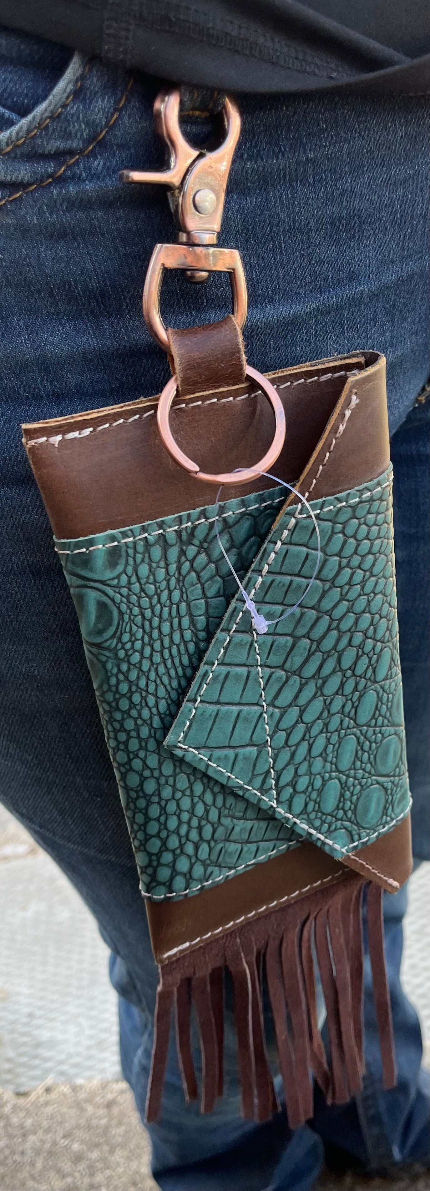 Turquoise gator clip on phone case with fringe