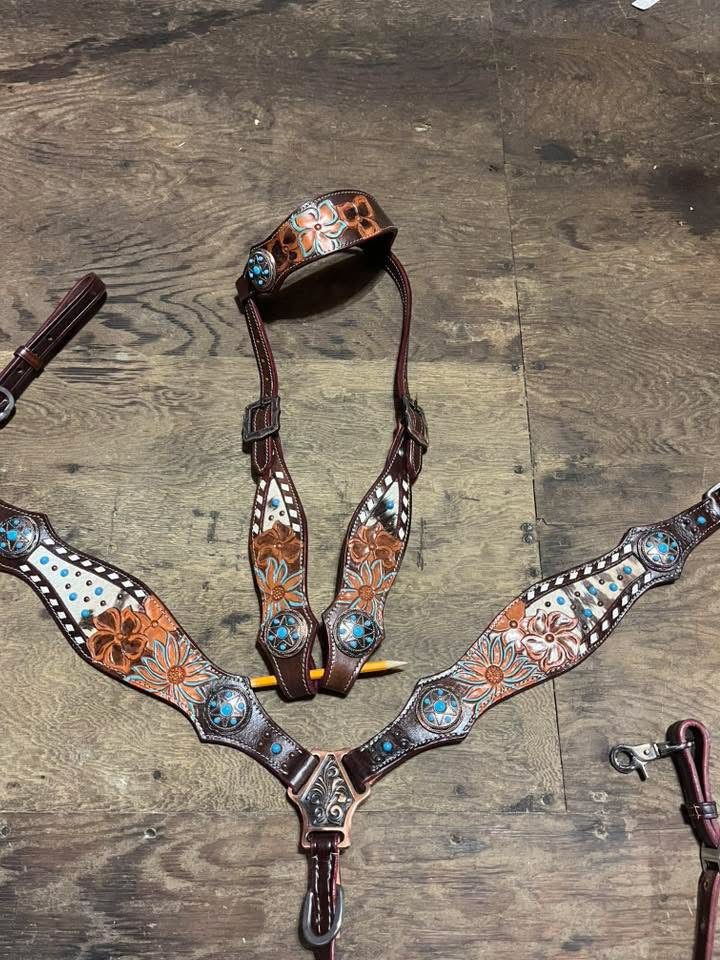 White buckstitch with teal flowers tack set