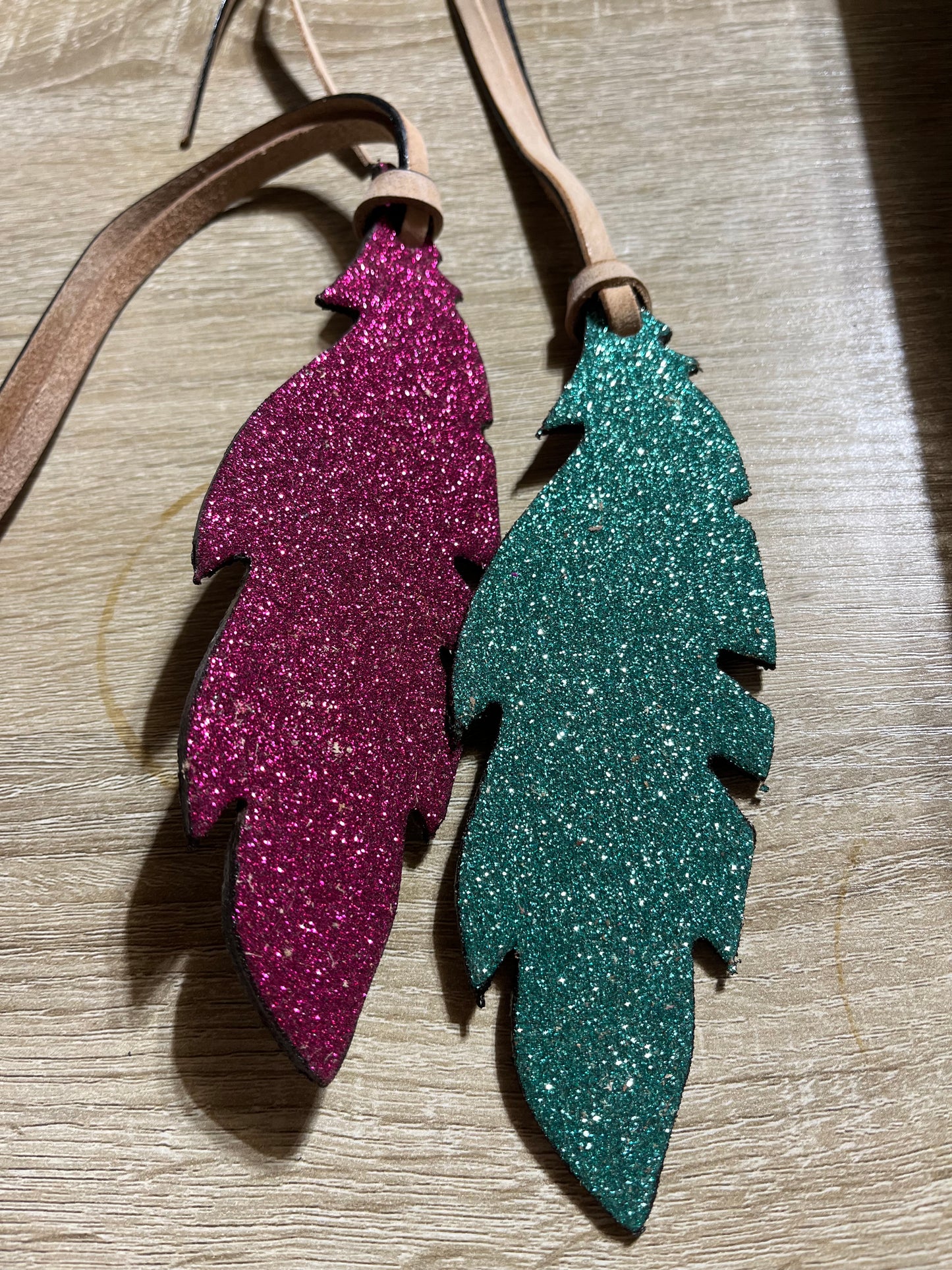 Feather glitter tie on charms