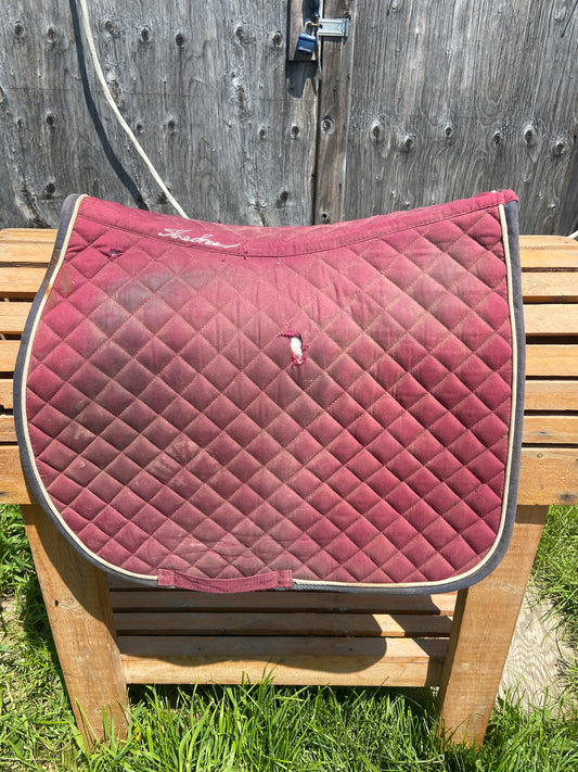 Burgundy full pad has hole as seen