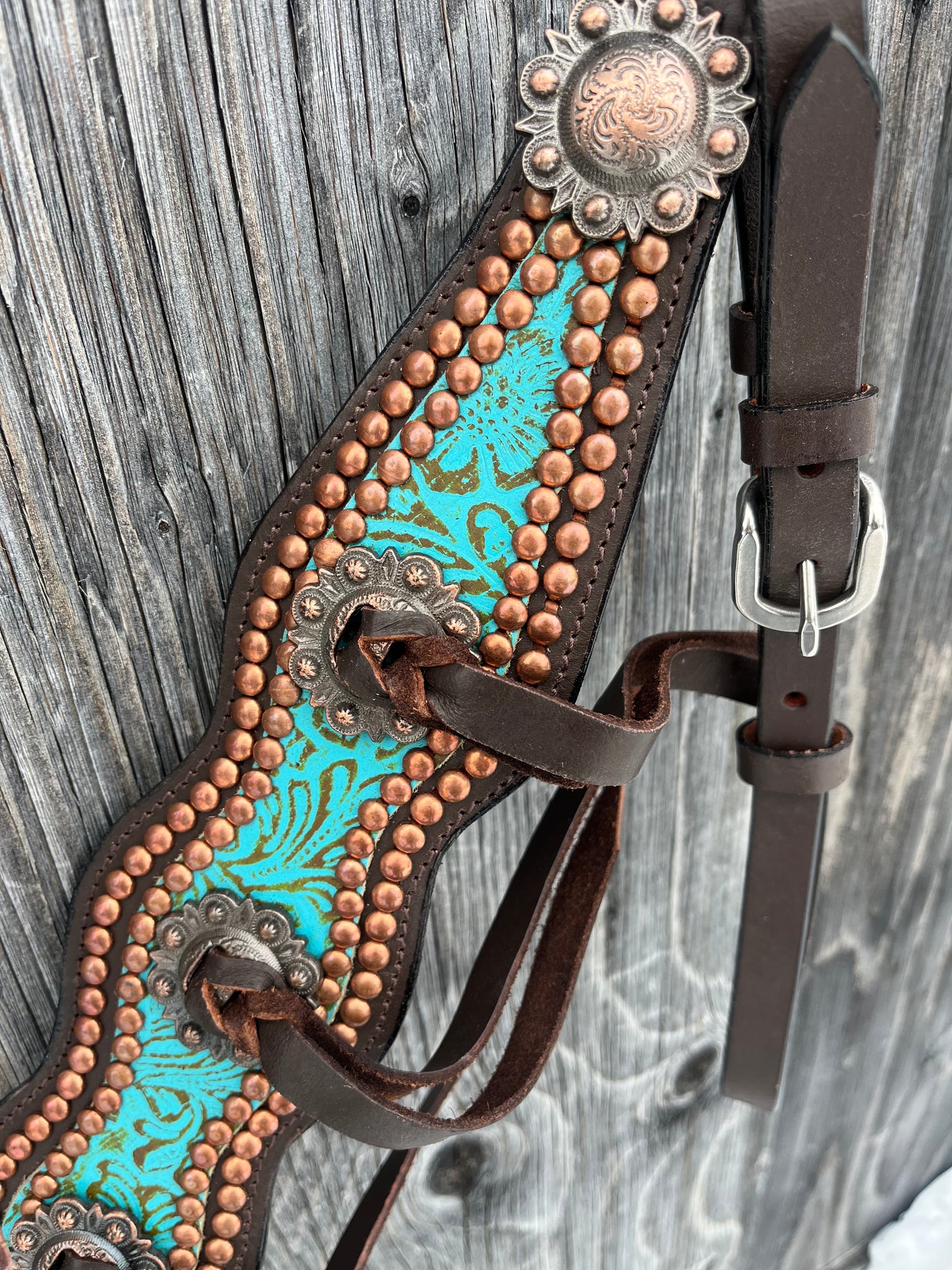 Teal one ear with tassels