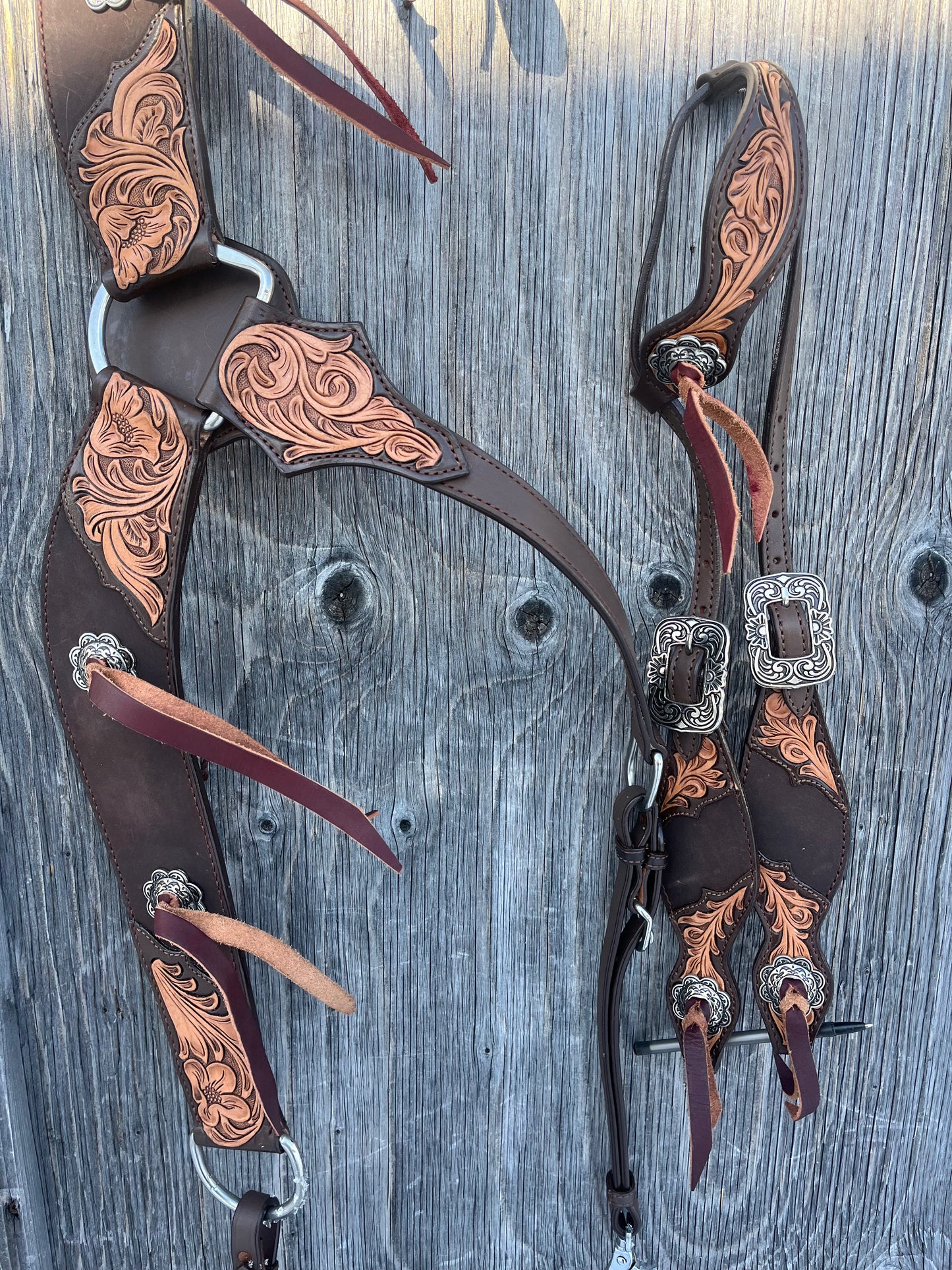 One ear tooled with slot concho tack set