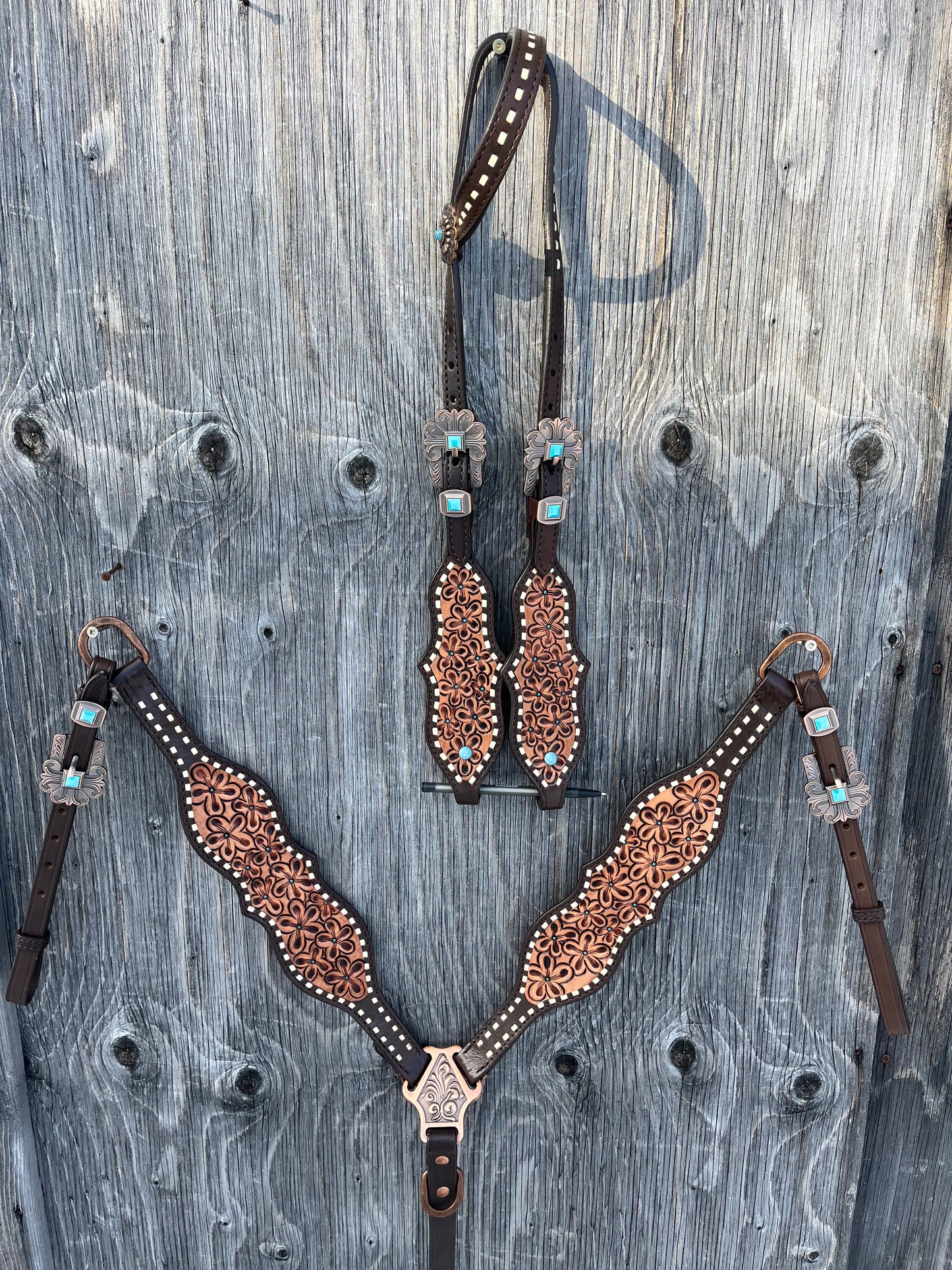 Flower tooled white buck stitch one ear tack set