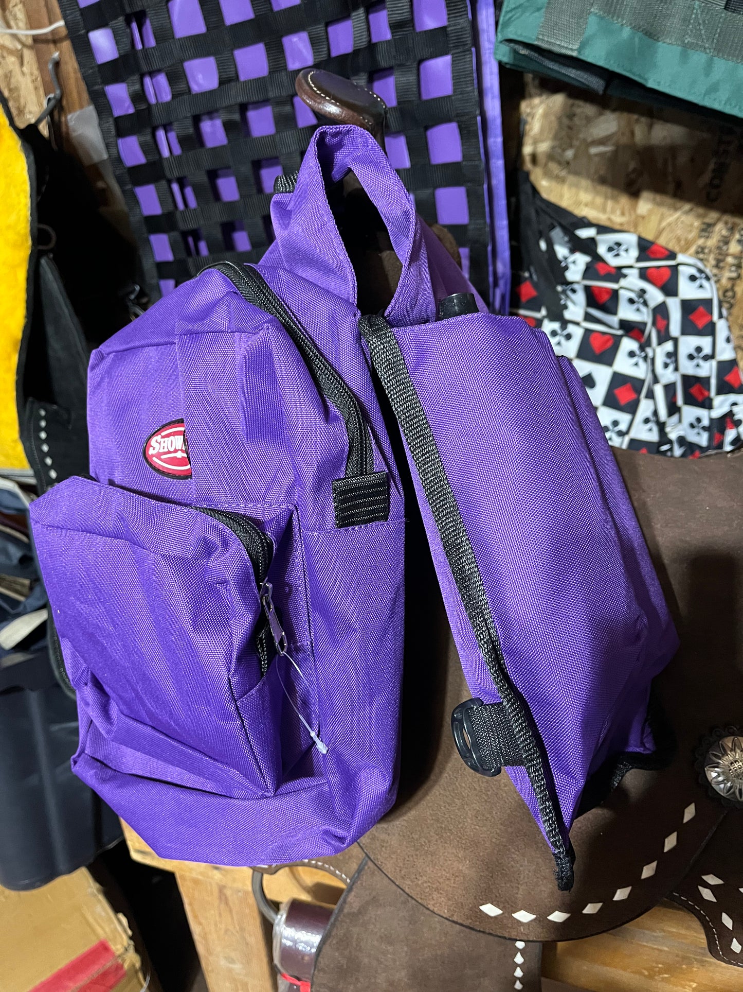 Purple horn bag with water bottles