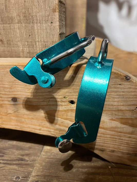 Teal sparkly bumper spurs