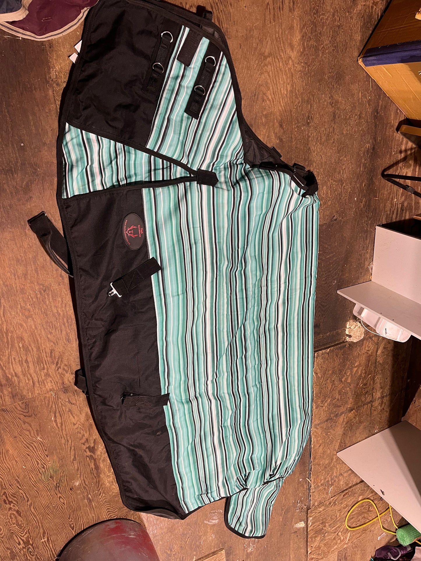 76” teal serape gently used looks next to new winter turnout