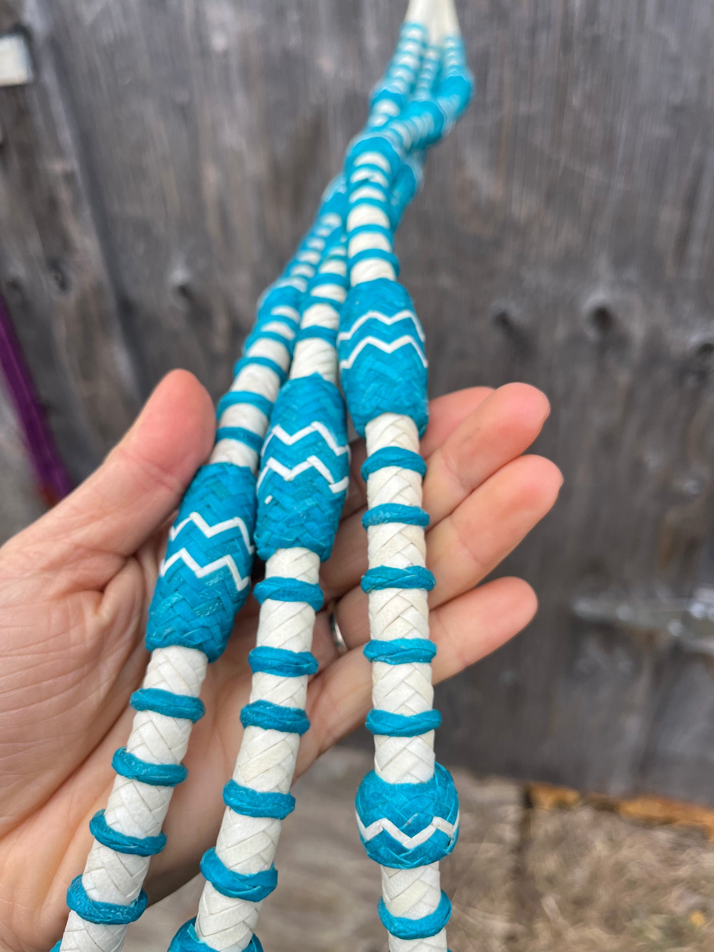 Teal rawhide Rommel reins