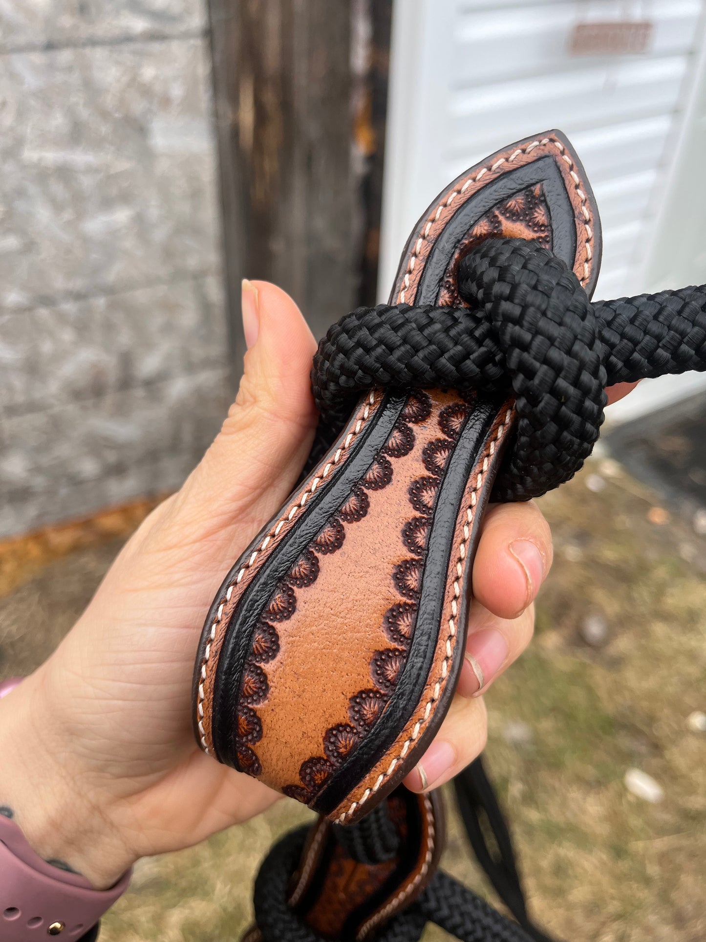 Rolled black reins with slobber straps