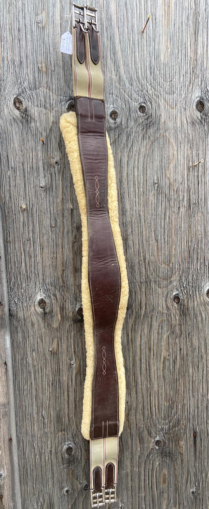 50” fancy stitched leather girth with removable sheepskin