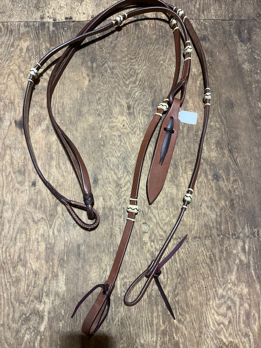 Leather romal reins with rawhide accents