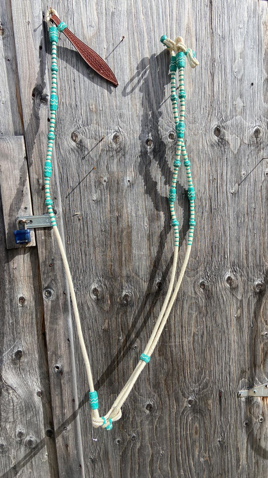 Teal rawhide Romal reins with popper