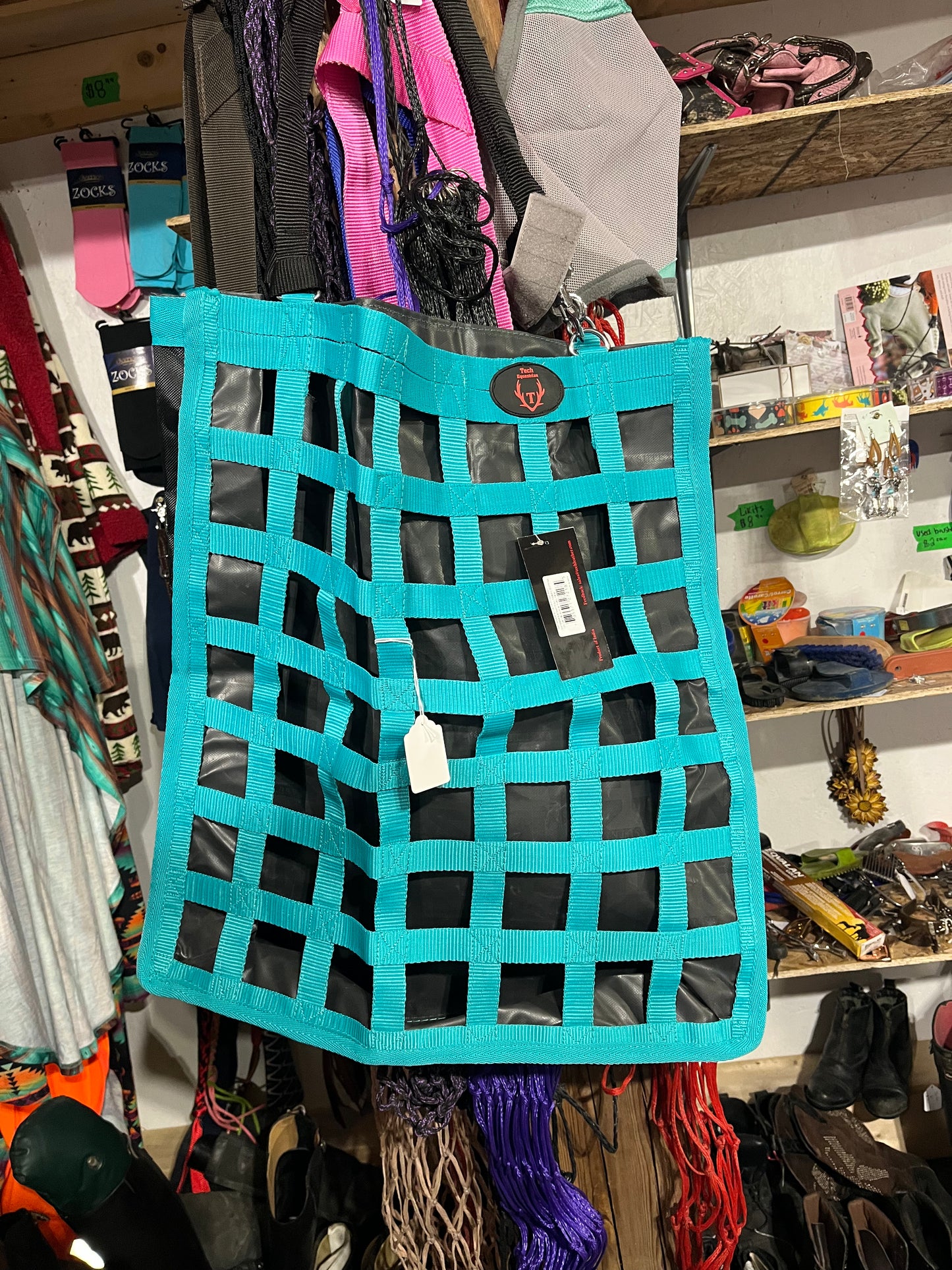 Teal and black hay bag